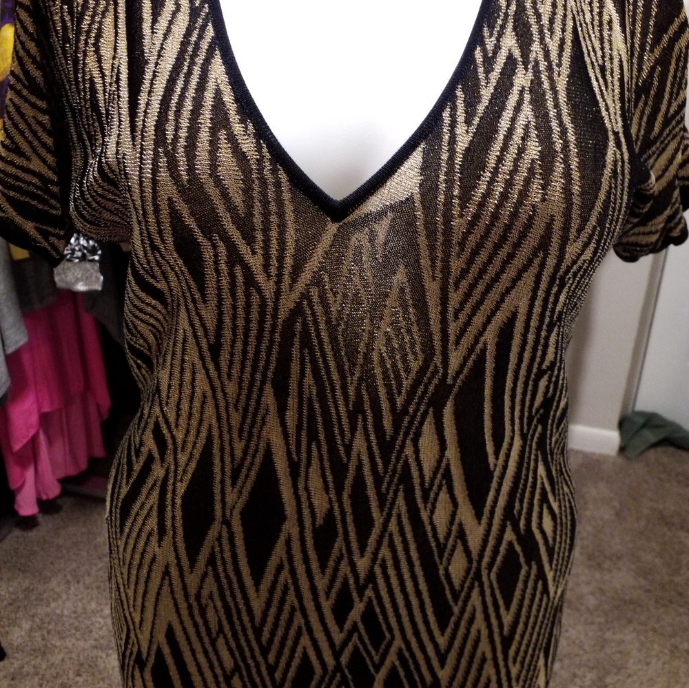 Gold and black knit top